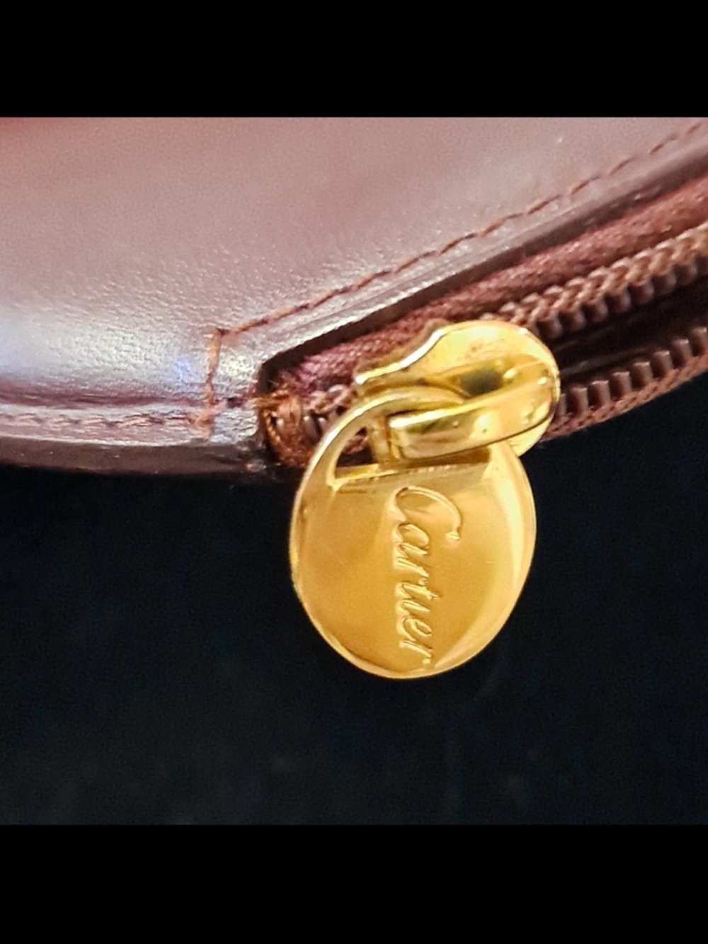 Cartier Burgundy Leather Round Coin Pouch with Gold Zip Pull - Picture 2 of 8